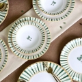 24-delars middagsservis, vit/grön/guld, i keramik