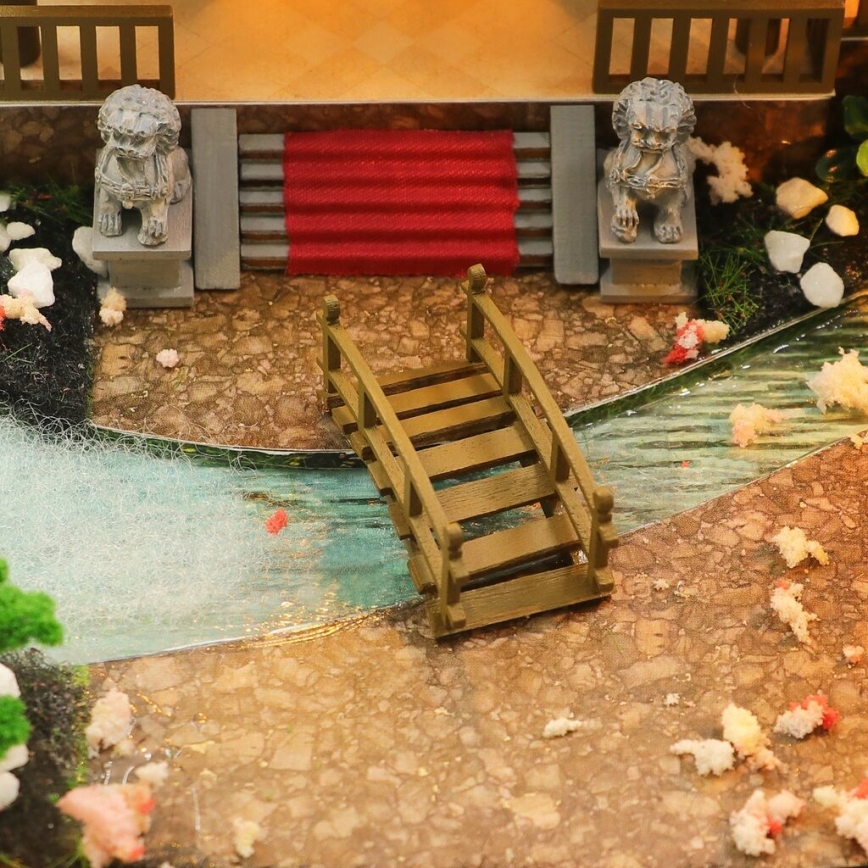 2Kids Toys - Miniatyr av sagovilla med hus 2xAAA