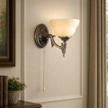 BRILAGI - Vägglampa DAHLIA 1xE27/40W/230V mässing