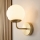Brilagi - Vägglampa MALIVA 1xE14/15W/230V guld/vit