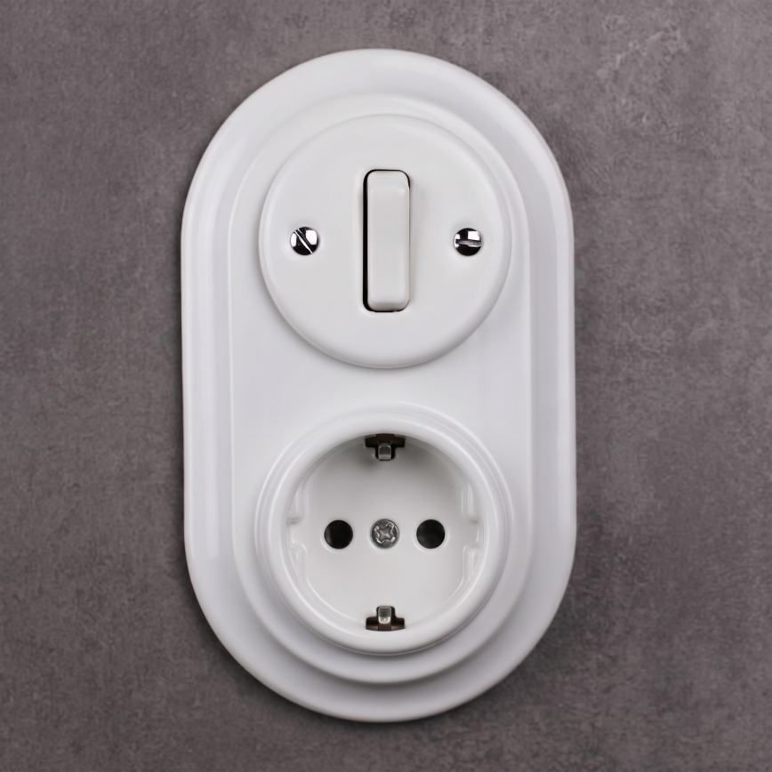 Elhard - Keramisk retroströmbrytare nr 1 och 230V-uttag med SCHUKO-ram, vit