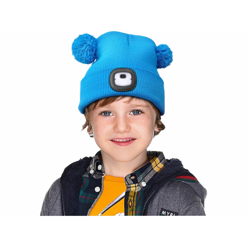 Extol - Mössa med pannlampa och USB-uppladdningsbart batteri 250 mAh, blå med pom-poms, barnstorlek
