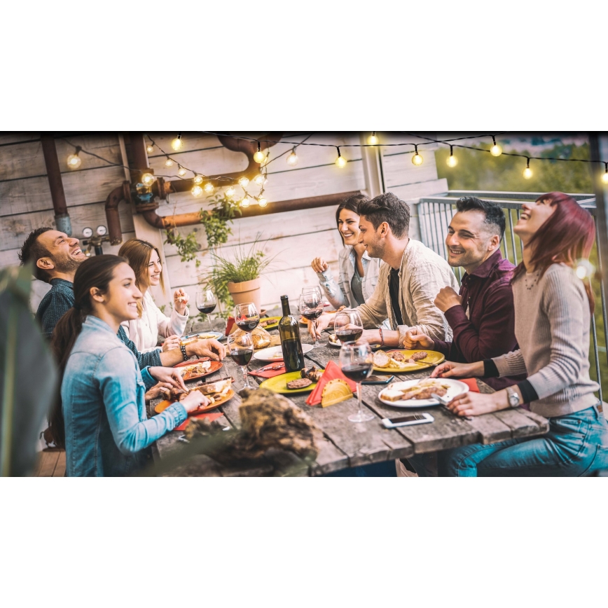 Grundig - LED dimbar solcellsslinga 50xLED/8 funktioner 9,35 m varmvit 1200 mAh + fjärrkontroll