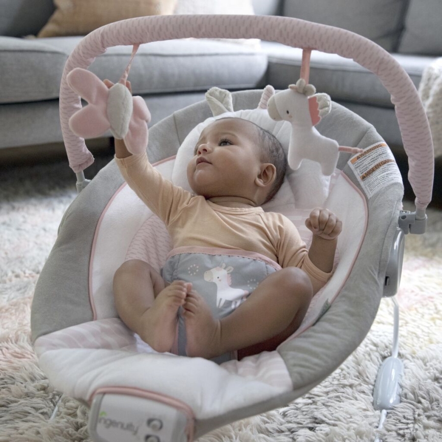 Ingenuity - Vibrerande babysitter med musik FLORA THE UNICORN 3xC
