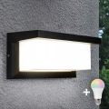 LED RGBW dimbar utomhusvägglampa NEELY 1xE27/9W/230V 2700-6500K IP54 Wi-Fi svart