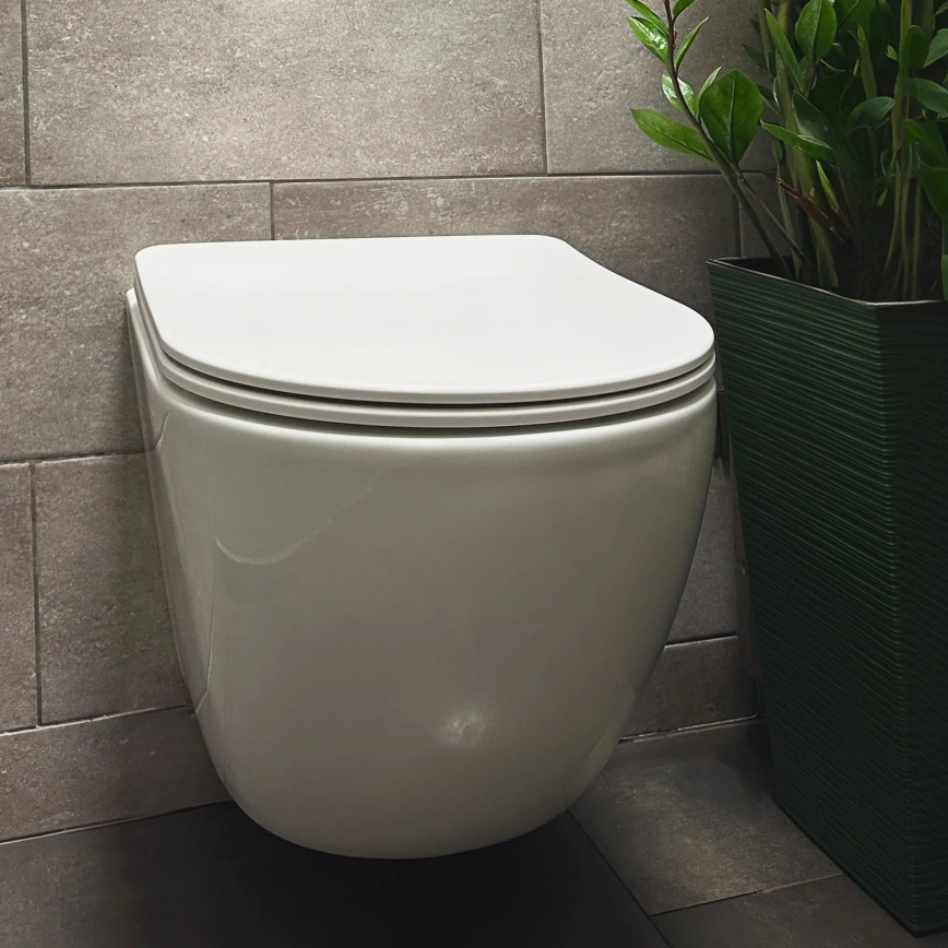 REA-C1259 - Vägghängd toalettstol med sits CARLO MINI TORNADO RIMLESS keramik/blank vit