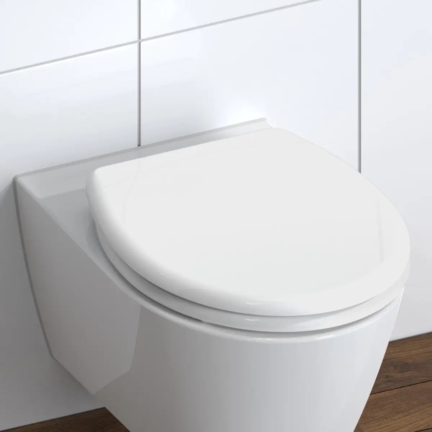 Schütte 82300-A - Toalettsits vit med SoftClose i duroplast