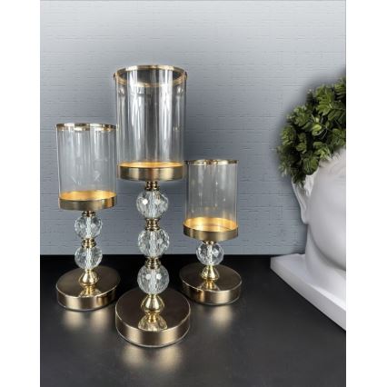 Set med 3 ljusstakar i guld