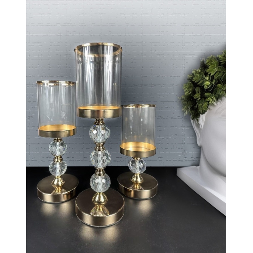 Set med 3 ljusstakar i guld