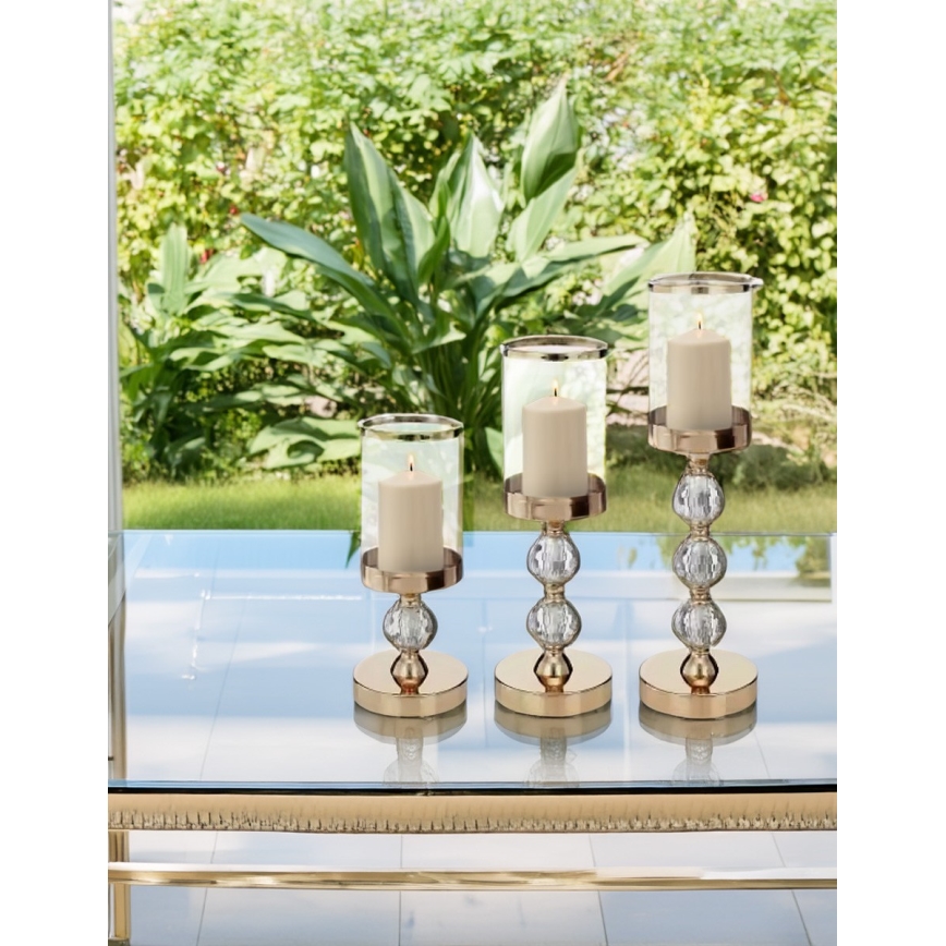 Set med 3 ljusstakar i guld
