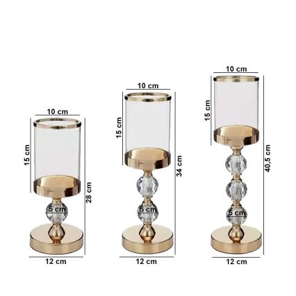 Set med 3 ljusstakar i guld