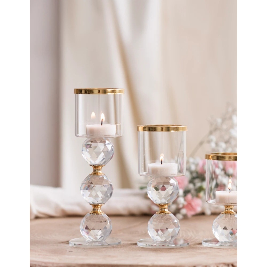 Set om 3 ljusstakar i guld och klart glas