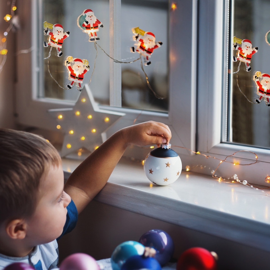 LED julslinga med sugproppar 6xLED/2xAA 1,2m varmvit santa